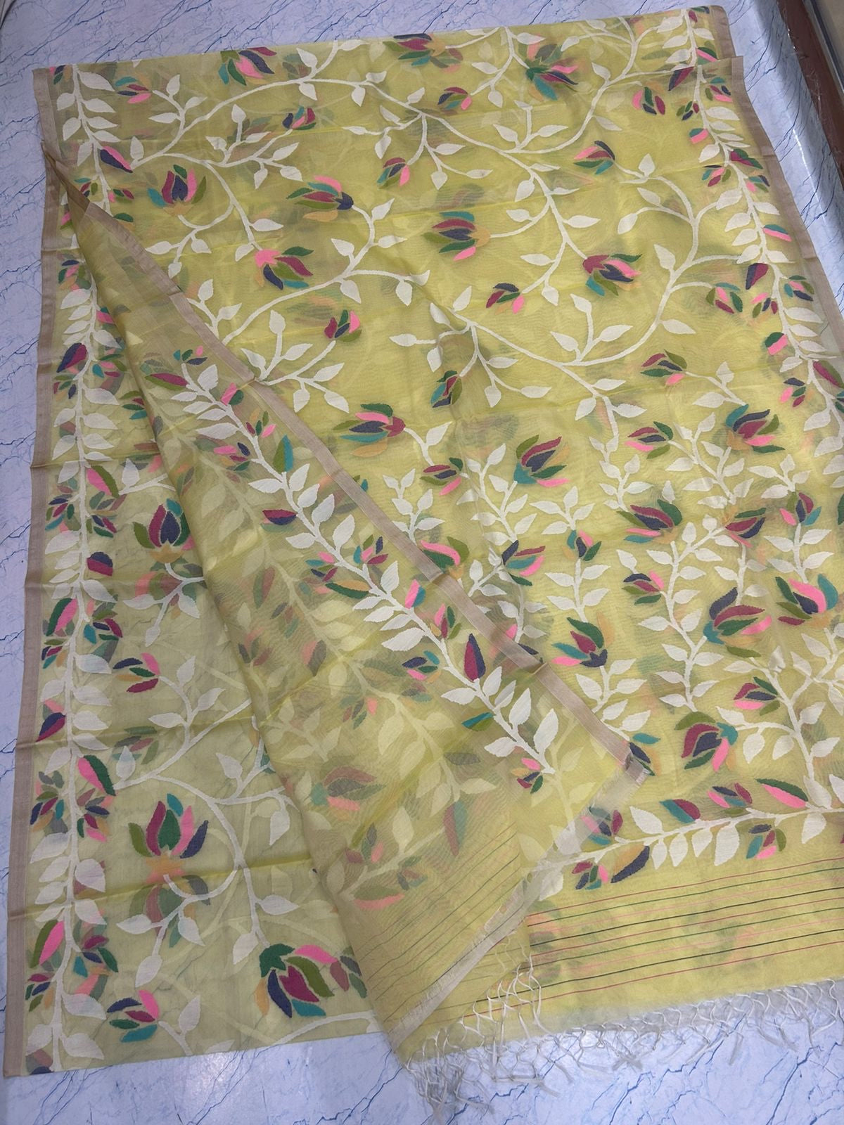 Yellow floral tantuj jamdani sarees - Saffronfashionindia