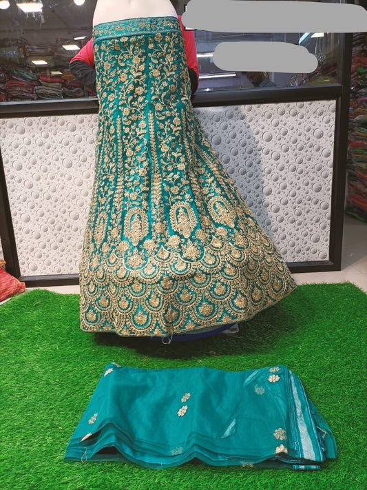 Turquoise velvet embroidered lehanga choli - Saffronfashionindia