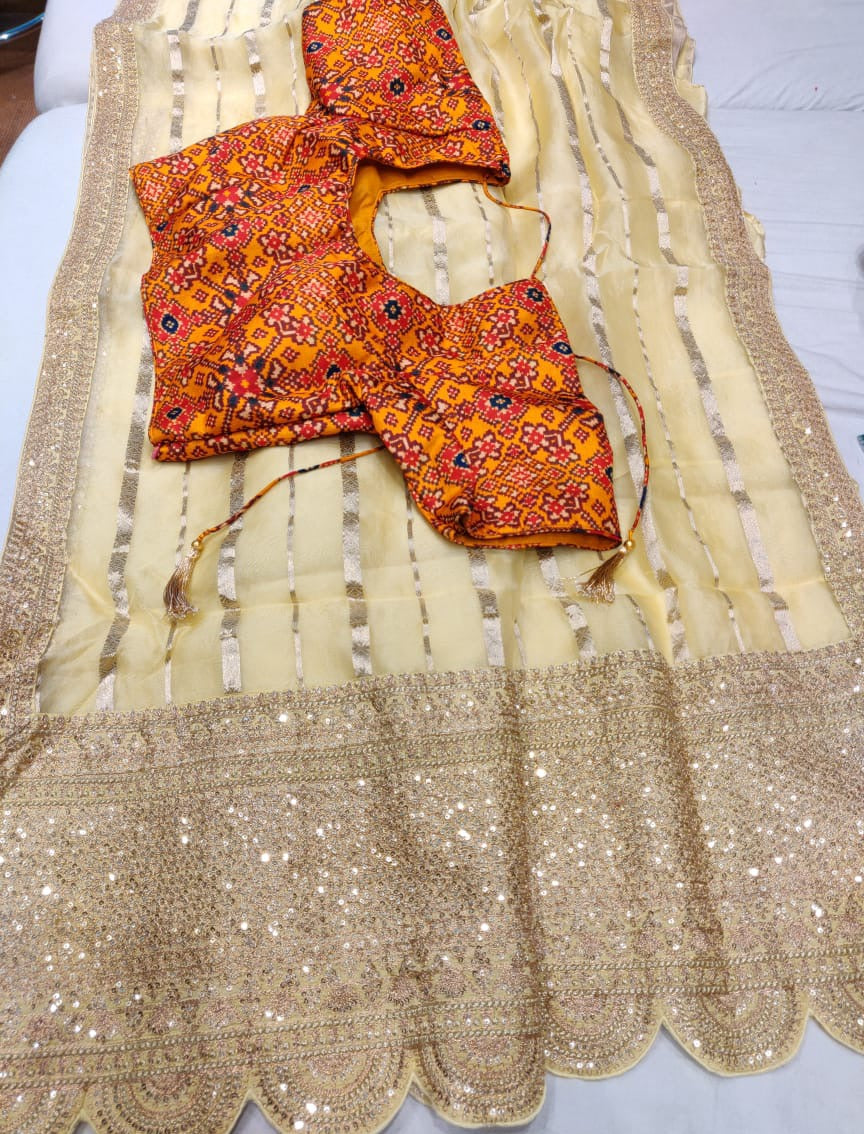 Hansik striped organza saree - Saffronfashionindia