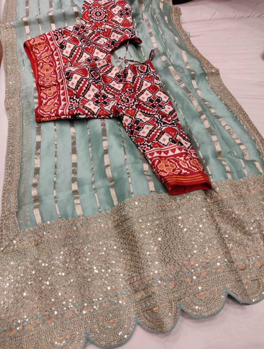 Hansik striped organza saree - Saffronfashionindia