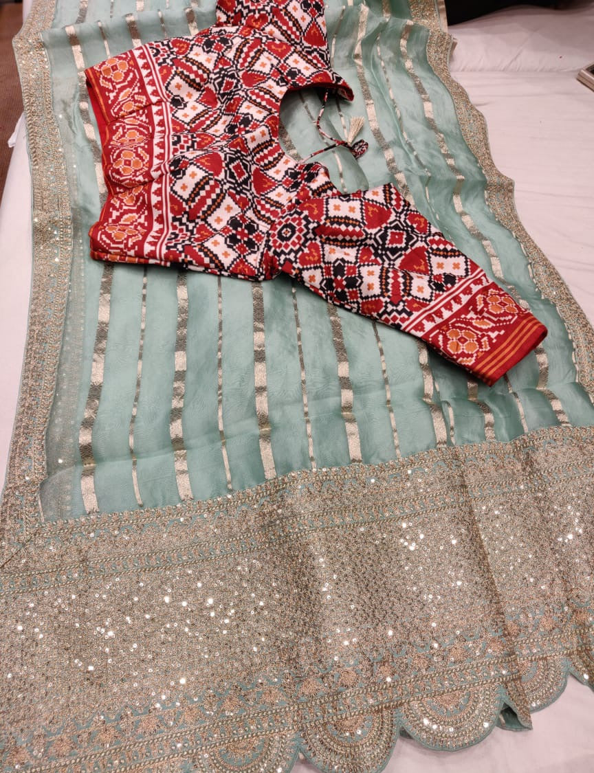 Hansik striped organza saree - Saffronfashionindia