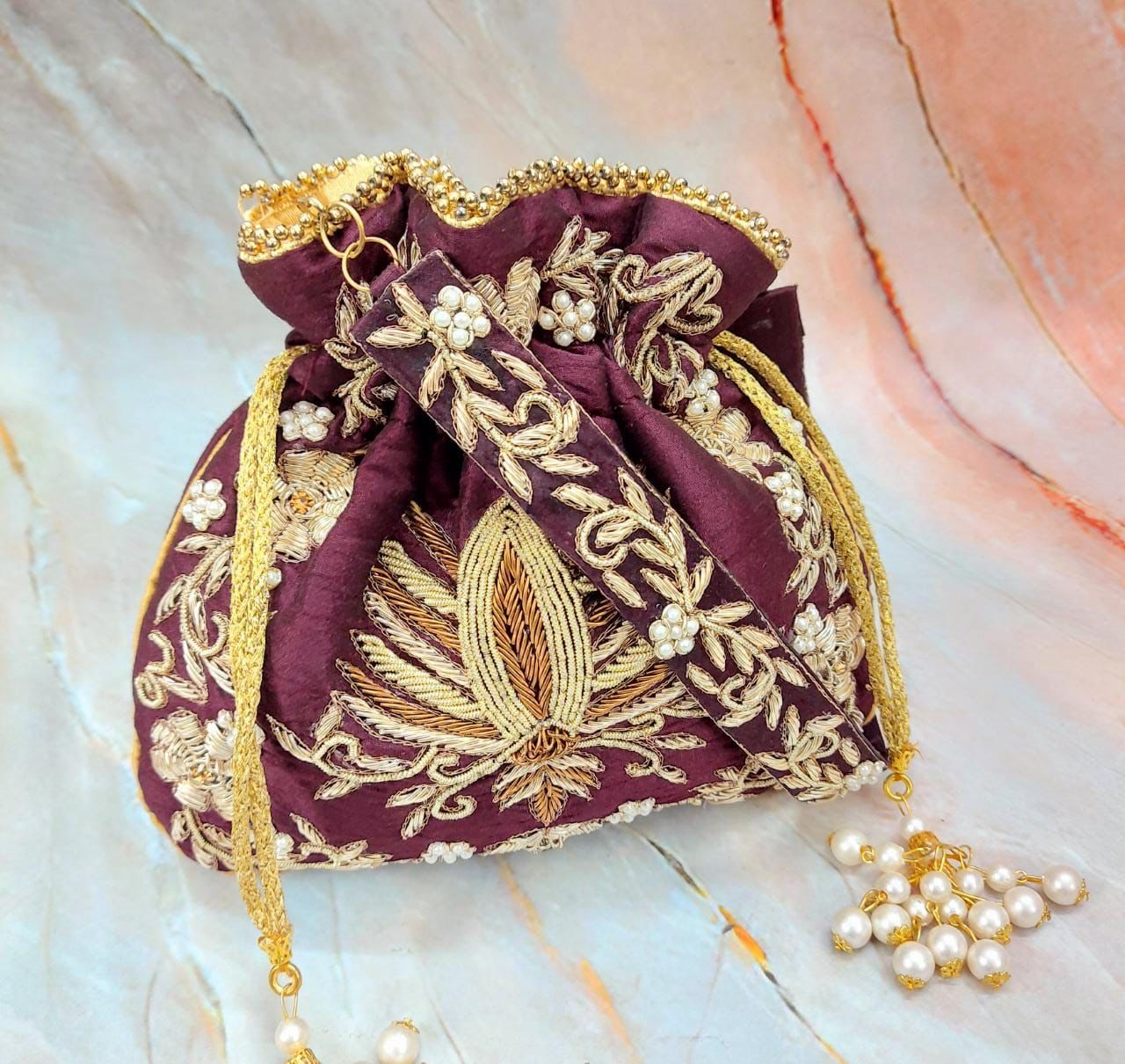 Malvika zardosi potlis - Saffronfashionindia