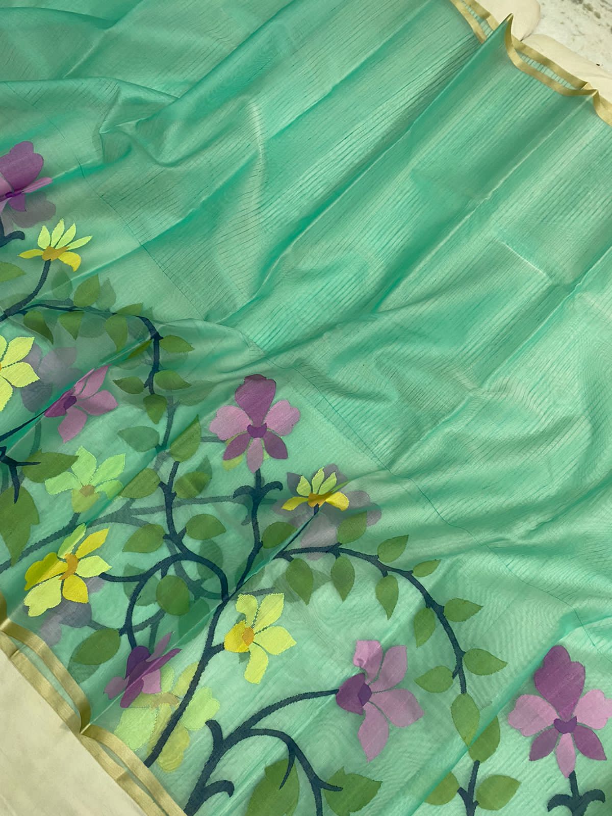 Roshni muslin tantuj saree - Saffronfashionindia