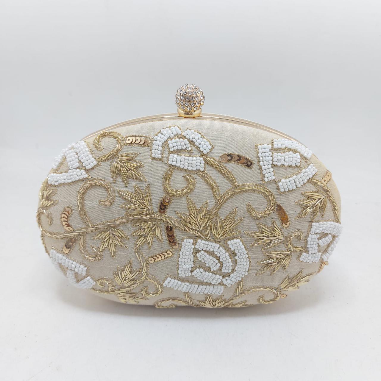 Oval clutch bag - Saffronfashionindia