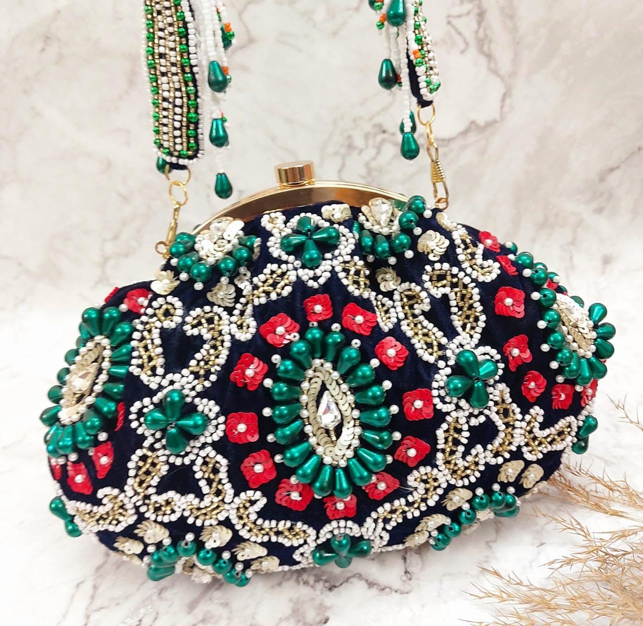 Noorjaha embroidered potlis - Saffronfashionindia
