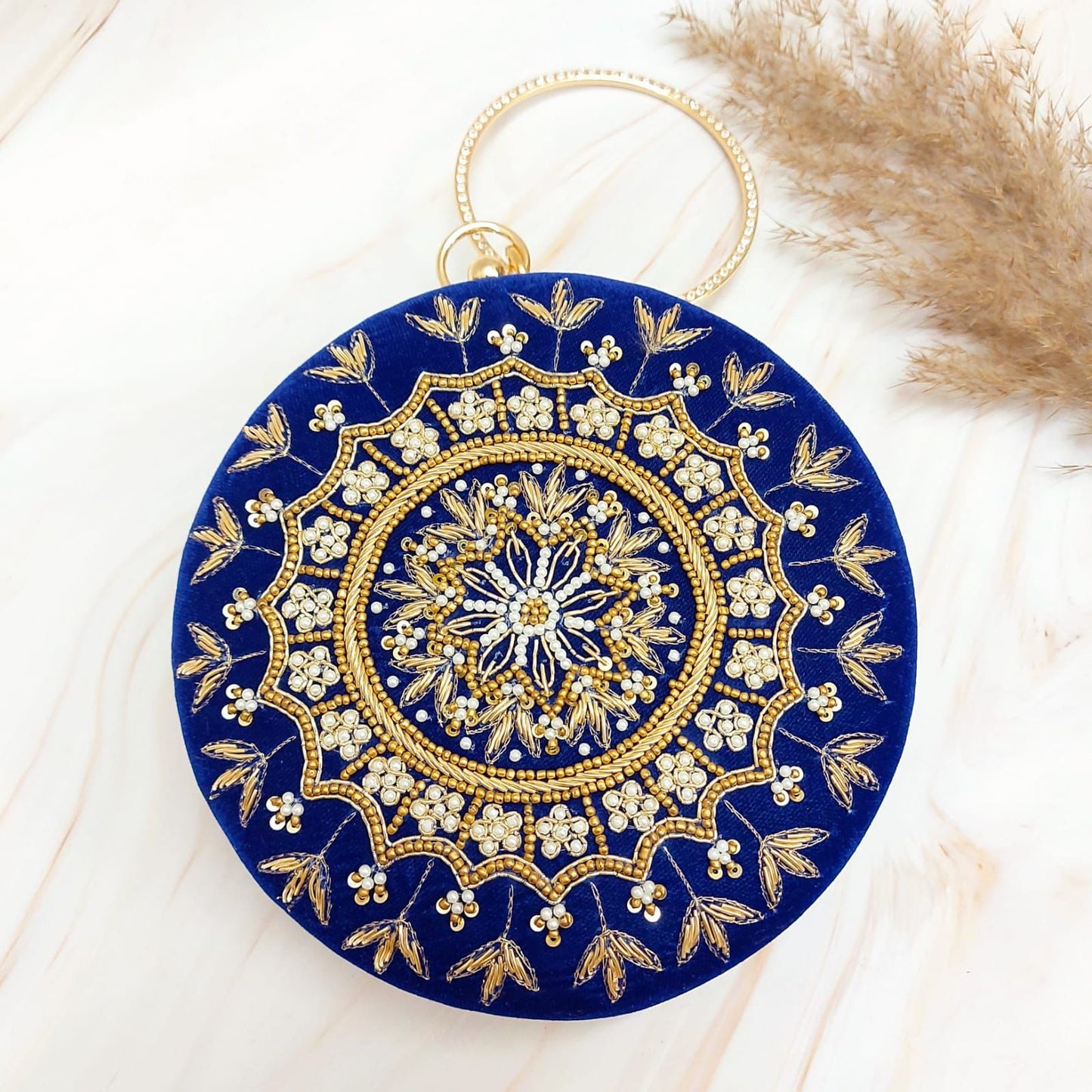 Alma round clutch - Saffronfashionindia