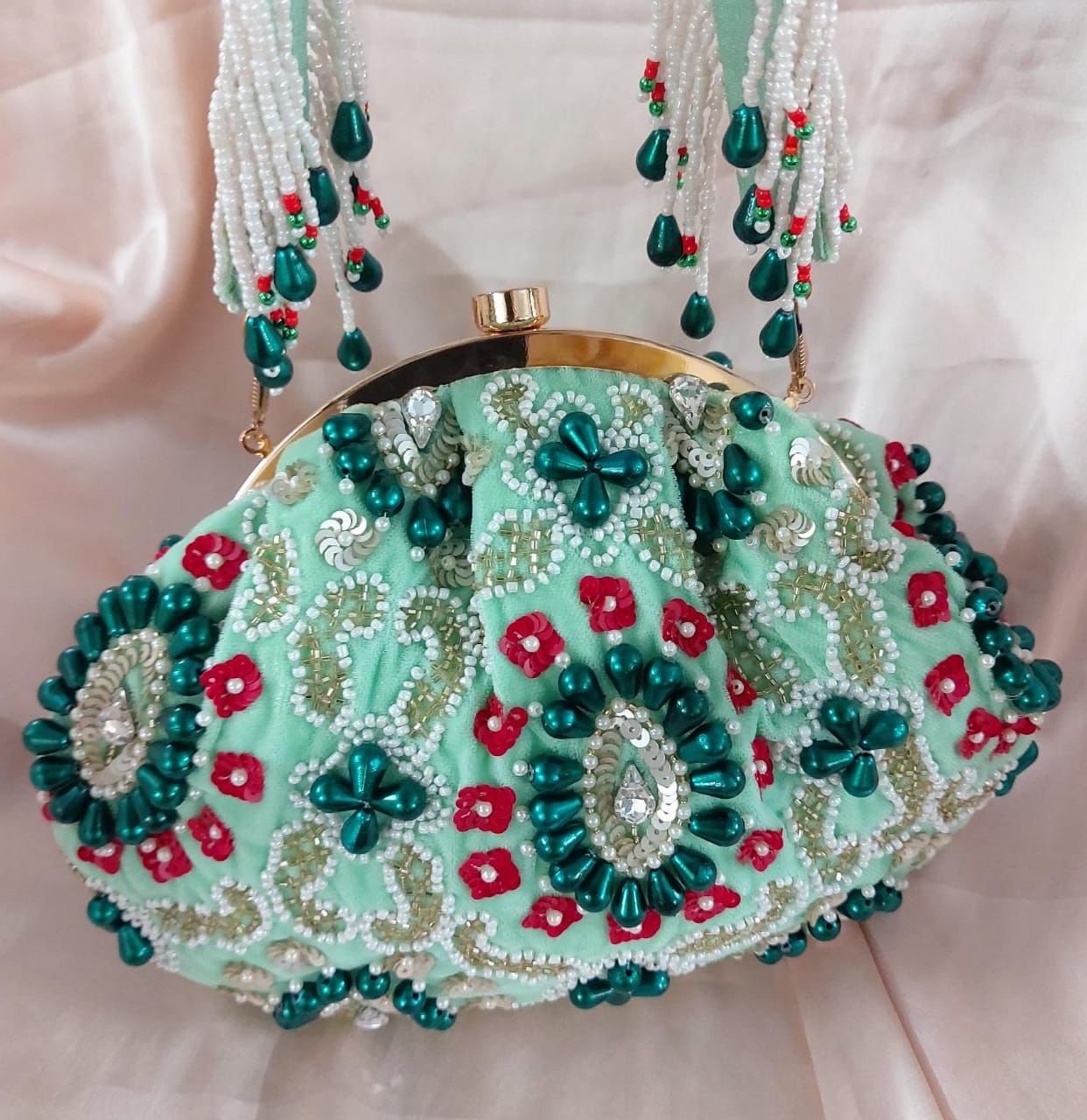 Noorjaha embroidered potlis - Saffronfashionindia