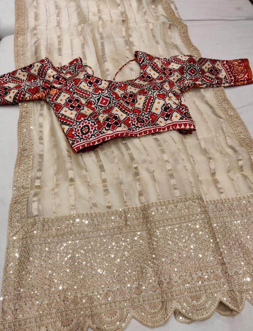 Hansik striped organza saree - Saffronfashionindia
