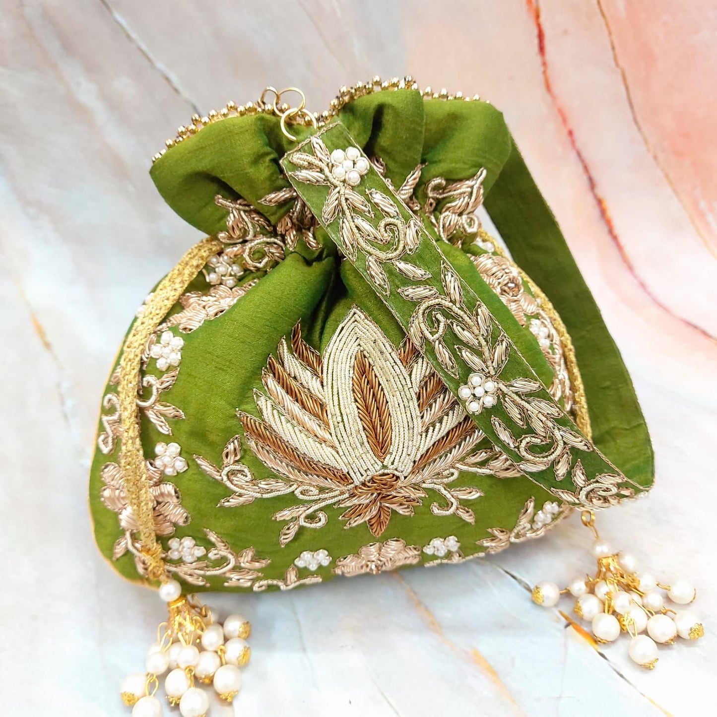 Malvika zardosi potlis - Saffronfashionindia